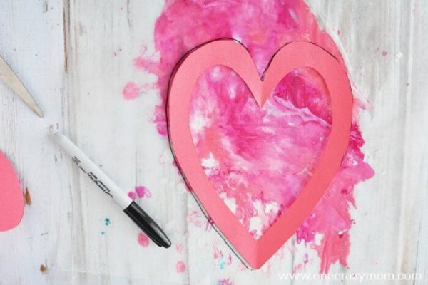 Let the kids make homemade suncatchers for the perfect Valentine's Day Craft. They will love this heart suncatcher and it's so simple to make. Let the kids make homemade suncatchers for the perfect Valentine's Day Craft. They will love this heart suncatcher and it's so simple to make.