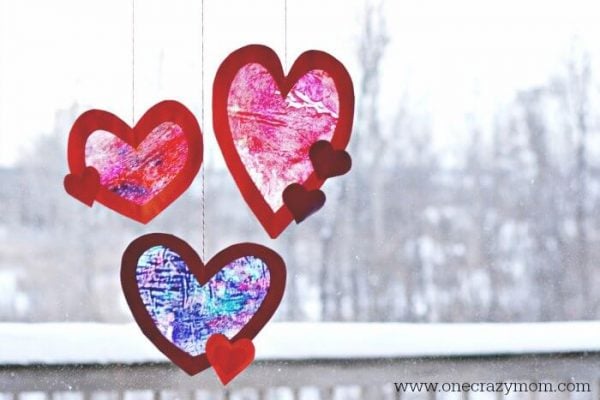 Let the kids make homemade suncatchers for the perfect Valentine's Day Craft. They will love this heart suncatcher and it's so simple to make. Let the kids make homemade suncatchers for the perfect Valentine's Day Craft. They will love this heart suncatcher and it's so simple to make.