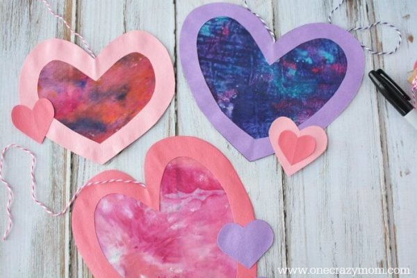 Let the kids make homemade suncatchers for the perfect Valentine's Day Craft. They will love this heart suncatcher and it's so simple to make. Let the kids make homemade suncatchers for the perfect Valentine's Day Craft. They will love this heart suncatcher and it's so simple to make.