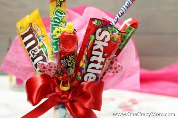 We have the best Graduation Party Ideas. You will find a big list of decor ideas, party food recipes, gifts and more to make your party a success. Candy bouquet in a vase.