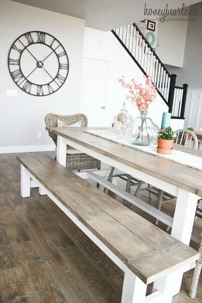 We have over 20 DIY Farmhouse decor ideas that are easy to make. Find lots of ideas that are budget friendly and simple to create for your home. Table and bench in dining room.