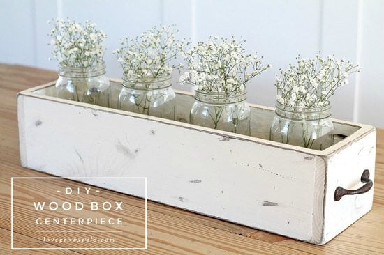 We have over 20 DIY Farmhouse decor ideas that are easy to make. Find lots of ideas that are budget friendly and simple to create for your home. Centerpiece made from old box.