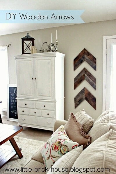 We have over 20 DIY Farmhouse decor ideas that are easy to make. Find lots of ideas that are budget friendly and simple to create for your home. Arrows on wall beside armoire.