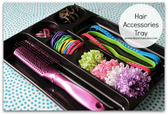 Get your home in order with Dollar Store Home Organization Ideas. 20 creative ways to make the most of your space with Dollar Store home organization. Hair accessories in a tray.