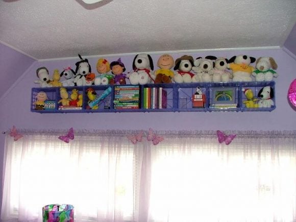 Get your home in order with Dollar Store Home Organization Ideas. 20 creative ways to make the most of your space with Dollar Store home organization. Crates on the wall with stuffed animals.