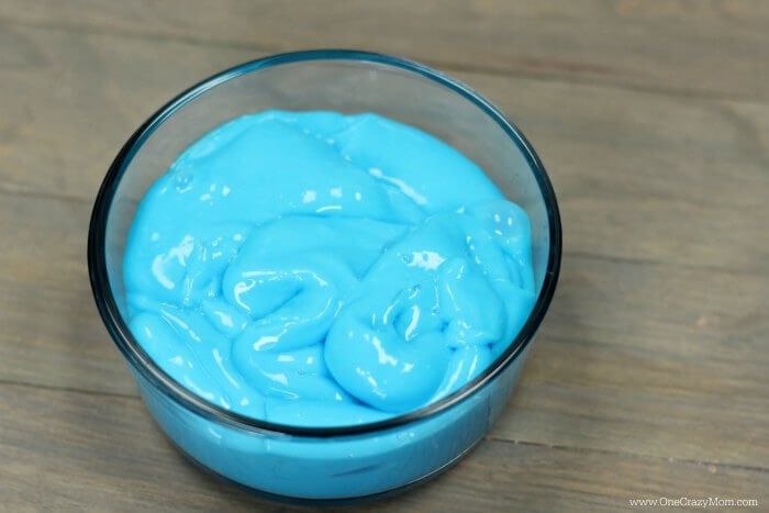 Learn how to make slime for kids that is calming for a great sensory activity. You only need a few simple ingredients for this quick slime recipe. Slime in a bowl.