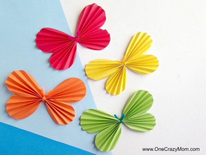 Make this fun butterfly craft for kids! DIY Butterfly Wall Art is so whimsical. Kid's will love making this DIY Paper Butterfly. Easy Paper Butterfly Craft for Kids is fun and easy! Paper butterflies hanging on wall.