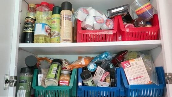You will love these Dollar Store Kitchen Organization ideas! 20 Kitchen Organization hacks to get your kitchen in order for just a $1! You can't beat that! Bins with spices in pantry.