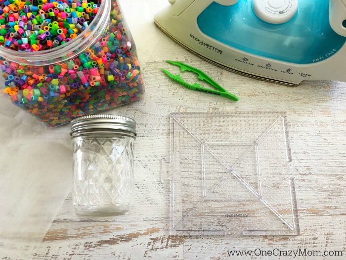 Supplies for Perler bead bracelets.