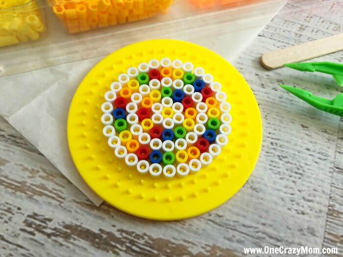 Perler beads are so fun and this Lollipop Perler Beads Craft is the perfect activity for the kids. This craft idea is simple and frugal but a blast to make! Perler beads are so fun and this Lollipop Perler Beads Craft is the perfect activity for the kids. This craft idea is simple and frugal but a blast to make!