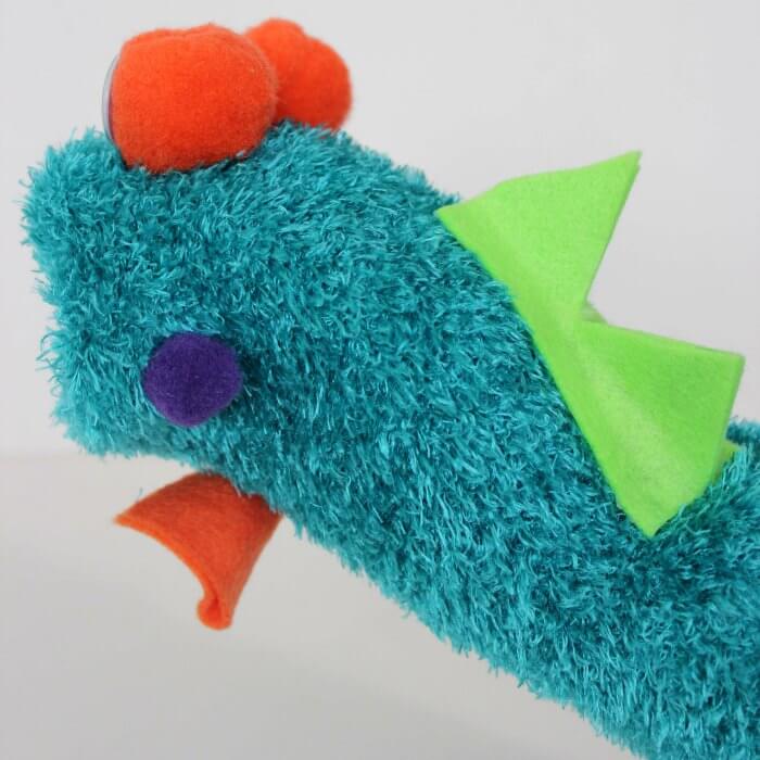Learn how to make a hand puppet! It's very simple to make this diy sock puppet. Kids will love this easy diy hand puppet. Once you know how to make a sock puppet, it's so much fun! Make different puppets and have a puppet show! The back of puppet drying.