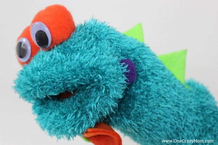 Learn how to make a hand puppet! It's very simple to make this diy sock puppet. Kids will love this easy diy hand puppet. Once you know how to make a sock puppet, it's so much fun! Make different puppets and have a puppet show! Sock Puppet ready to play with.