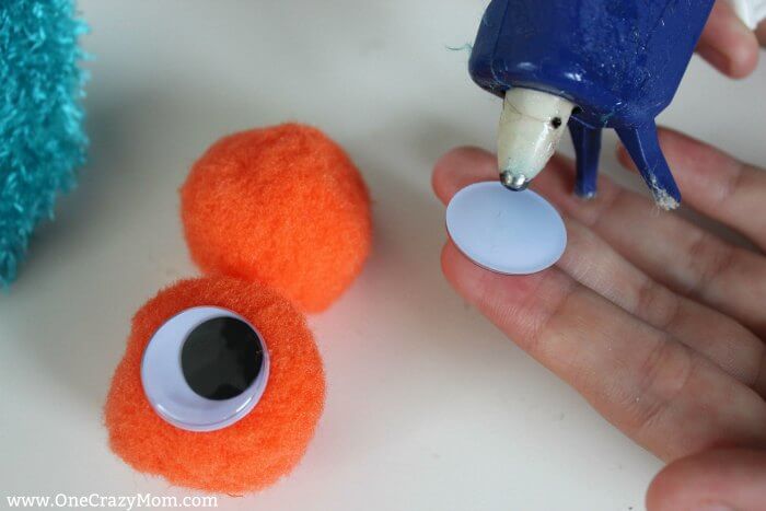 Learn how to make a hand puppet! It's very simple to make this diy sock puppet. Kids will love this easy diy hand puppet. Once you know how to make a sock puppet, it's so much fun! Make different puppets and have a puppet show! Googly eyes on pom poms.