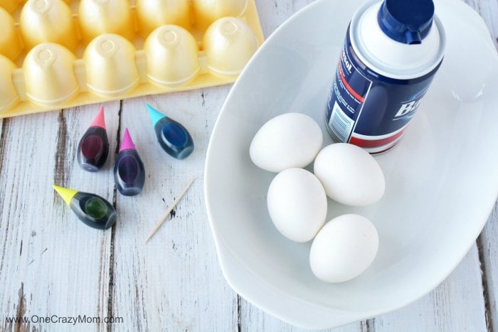Learn how to make shaving cream Easter eggs. Dying Easter eggs with shaving cream is fun and frugal. Kids will love making tie dye Easter eggs. Supplies for shaving cream eggs - shaving cream, eggs, food coloring.