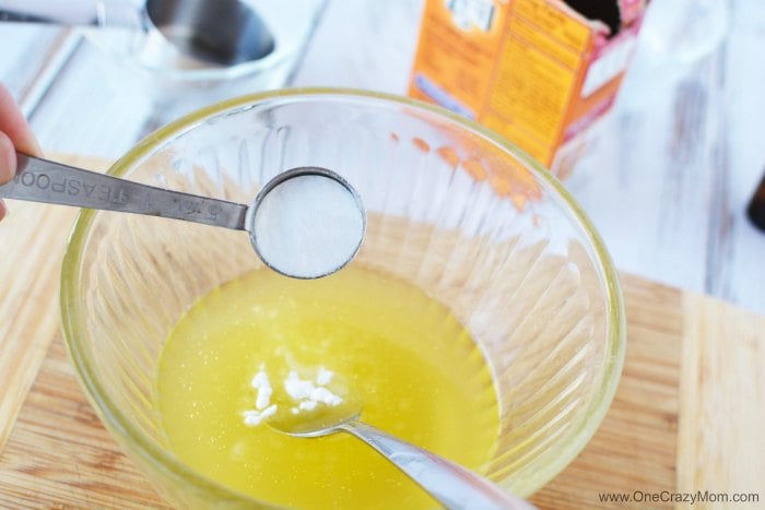 Try this diy shaving cream for Women for a closer shave.You will love how luxurious this natural shaving cream is. This easy homemade shaving cream leaves your skin silky smooth! Plus, its very simple and quick to make. Measuring spoon with ingredients being combined.