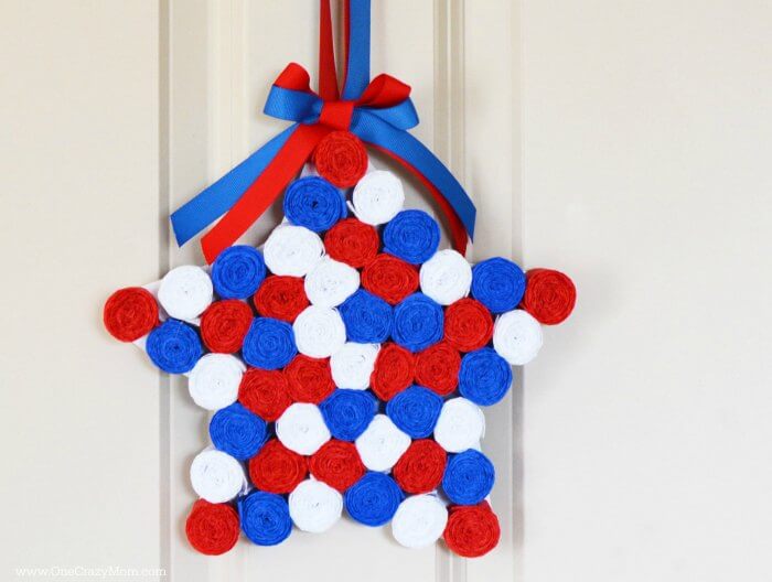 This DIY 4th of July wreath is made with crepe paper and takes very little time to make! Try this Fourth of July wreath with dollar store supplies! This DIY 4th of July wreath is made with crepe paper and takes very little time to make! Try this Fourth of July wreath with dollar store supplies!