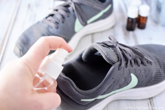 This easy DIY Shoe Deodorizer Spray works to get rid of yucky shoe odors. Learn how to make shoe spray for odor that is quick and easy. This is the best shoe odor spray. Shoe spray is very inexpensive to make. Try shoe odor spray and you will love how it works. Shoe odor eliminator is amazing! Spraying deodorizer in shoe.
