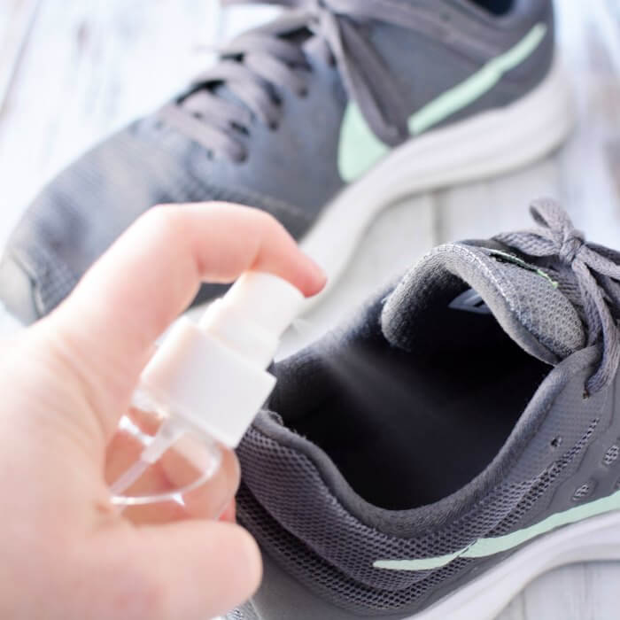 This easy DIY Shoe Deodorizer Spray works to get rid of yucky shoe odors. Learn how to make shoe spray for odor that is quick and easy. This is the best shoe odor spray. Shoe spray is very inexpensive to make. Try shoe odor spray and you will love how it works. Shoe odor eliminator is amazing! Spraying deodorizer in shoe.