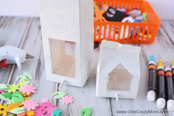 This Homemade Bird Feeder is so fun to make and it uses milk cartons. Kids will love making a milk carton bird feeder. Give this easy DIY Bird feeder a try. This Homemade Bird Feeder is so fun to make and it uses milk cartons. Kids will love making a milk carton bird feeder. Give this easy DIY Bird feeder a try.