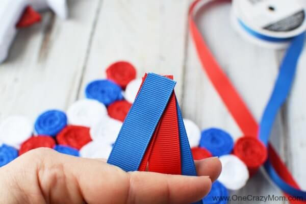 This DIY 4th of July wreath is made with crepe paper and takes very little time to make! Try this Fourth of July wreath with dollar store supplies! This DIY 4th of July wreath is made with crepe paper and takes very little time to make! Try this Fourth of July wreath with dollar store supplies!