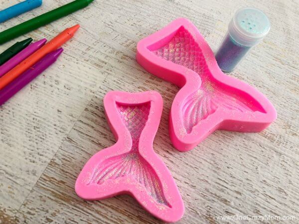 Learn how to make crayons shaped like mermaid tails! These are perfect for a mermaid birthday party. It's so easy once you know how to make crayons. Try these fun mermaid tails crayons. Kid's will love all the glitter! They are so pretty! Molds for crayons.