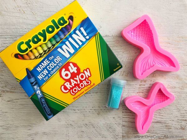 Learn how to make crayons shaped like mermaid tails! These are perfect for a mermaid birthday party. It's so easy once you know how to make crayons. Try these fun mermaid tails crayons. Kid's will love all the glitter! They are so pretty! supplies for Mermaid crayons
