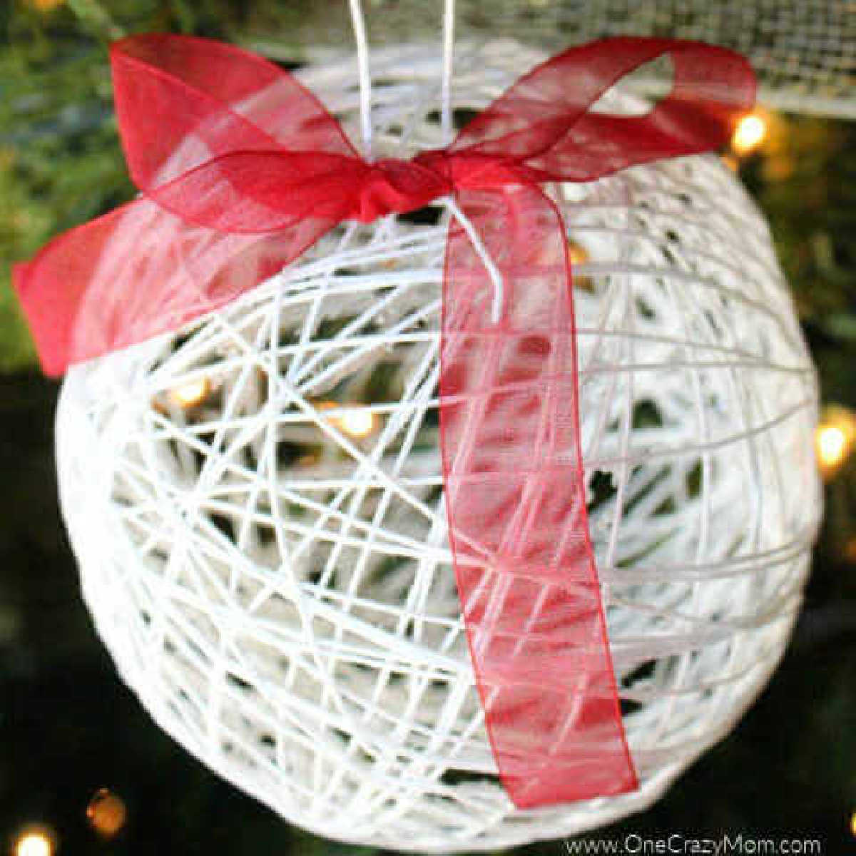 Learn how to make a string ornament for kids. It is so easy to make DIY Christmas Ornaments and budget friendly when all the supplies are from the Dollar Store! #onecrazymom #DIYornaments #christmasornaments