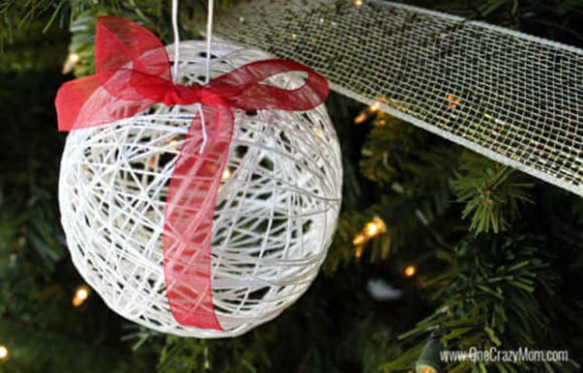 Learn how to make a string ornament for kids. It is so easy to make DIY Christmas Ornaments and budget friendly when all the supplies are from the Dollar Store! #onecrazymom #DIYornaments #christmasornaments