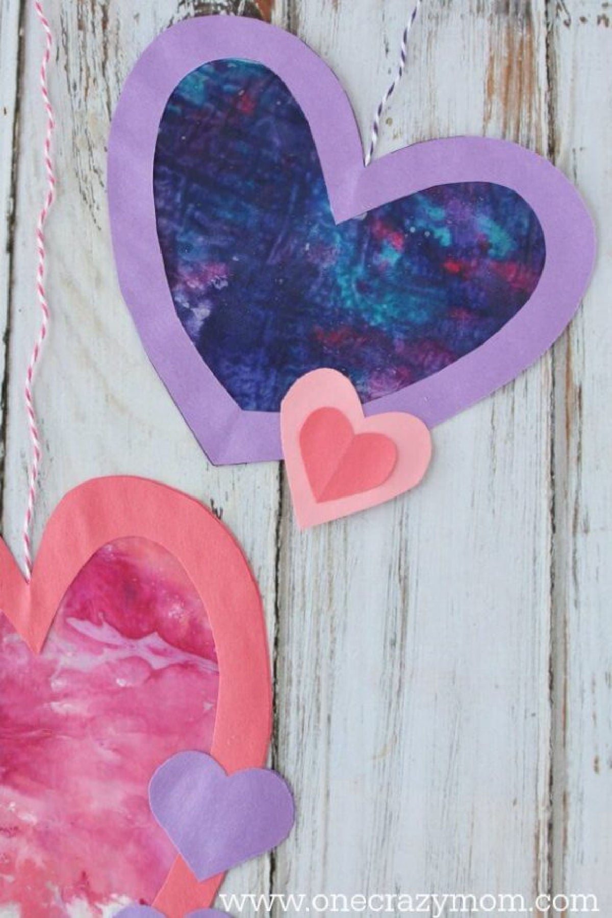 Let the kids make homemade suncatchers for the perfect Valentine's Day Craft. They will love this heart suncatcher and it's so simple to make. Let the kids make homemade suncatchers for the perfect Valentine's Day Craft. They will love this heart suncatcher and it's so simple to make.