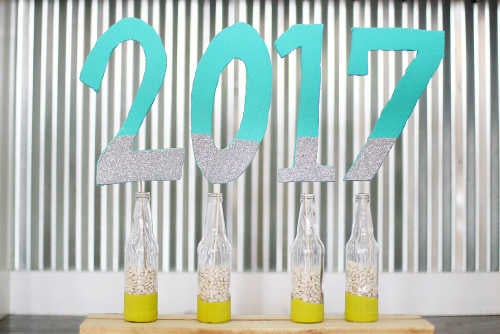 We have the best Graduation Party Ideas. You will find a big list of decor ideas, party food recipes, gifts and more to make your party a success. Graduation number sign in bottles.