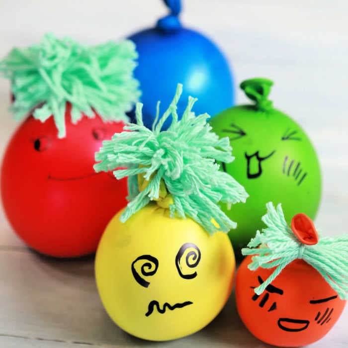 You will love how easy it is to make this DIY Stress Ball. Learn how to make a stress ball that helps to reduce stress and is fun to make. They are so cute! Stress balls grouped together.