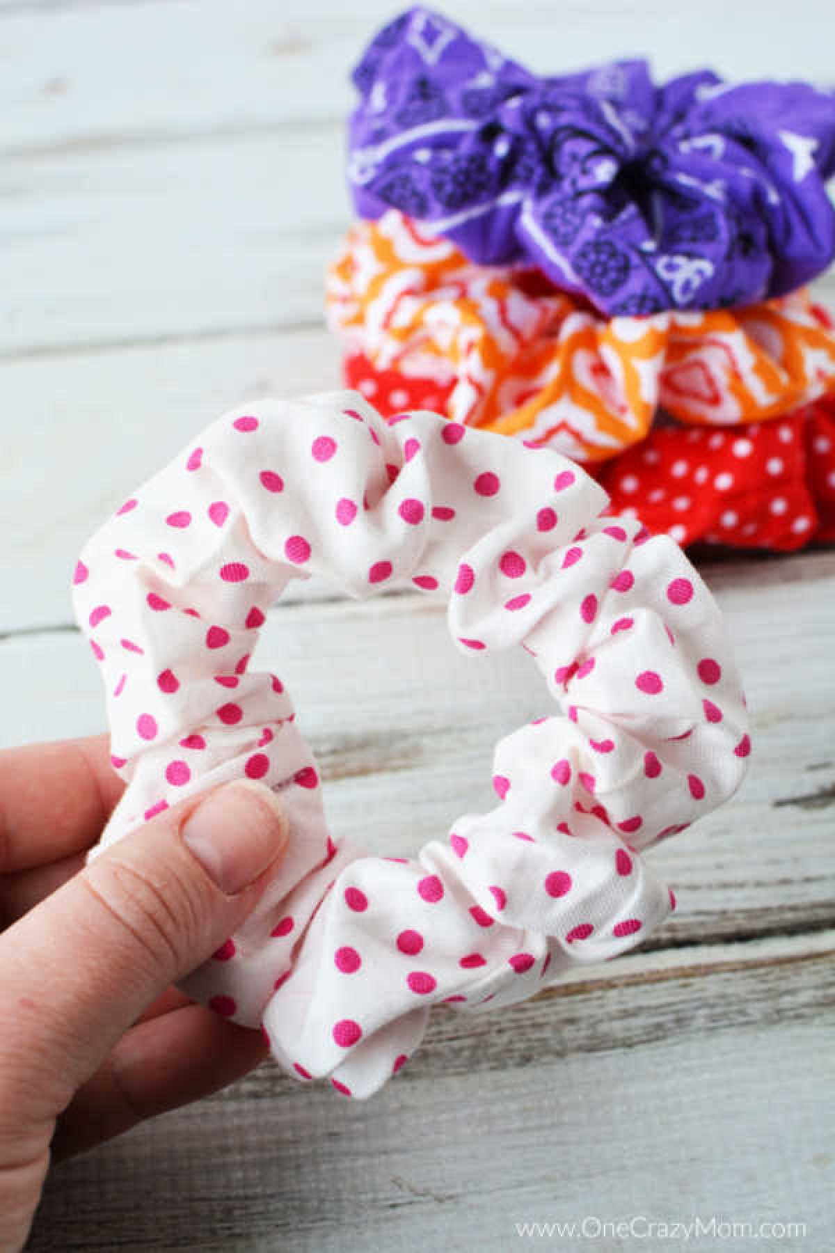 Learn how to make a scrunchie with just a few supplies. It is so easy to make a DIY Scrunchie that you can make them in just minutes and save money too. Assortment of scrunchies ready to use.