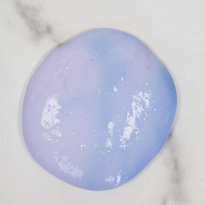 Color Changing Silly Putty Recipe is fun to make and a blast to play with. The kids will love to learn how to make silly putty that changes color. Color Changing Silly Putty in a pile.