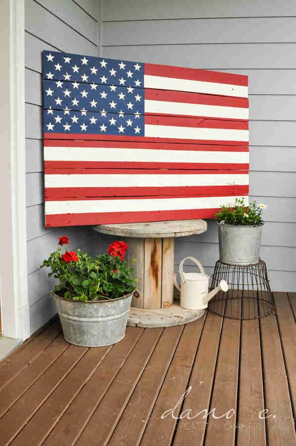 Wooden flag on porch.
