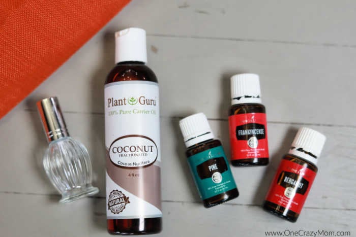 Learn how to make DIY Cologne for Men that is all natural and smells amazing. This homemade cologne is so easy and will be a hit. Supplies for cologne - bergamot essential oil, frankincense, pine, fractionated coconut oil, cologne bottle.