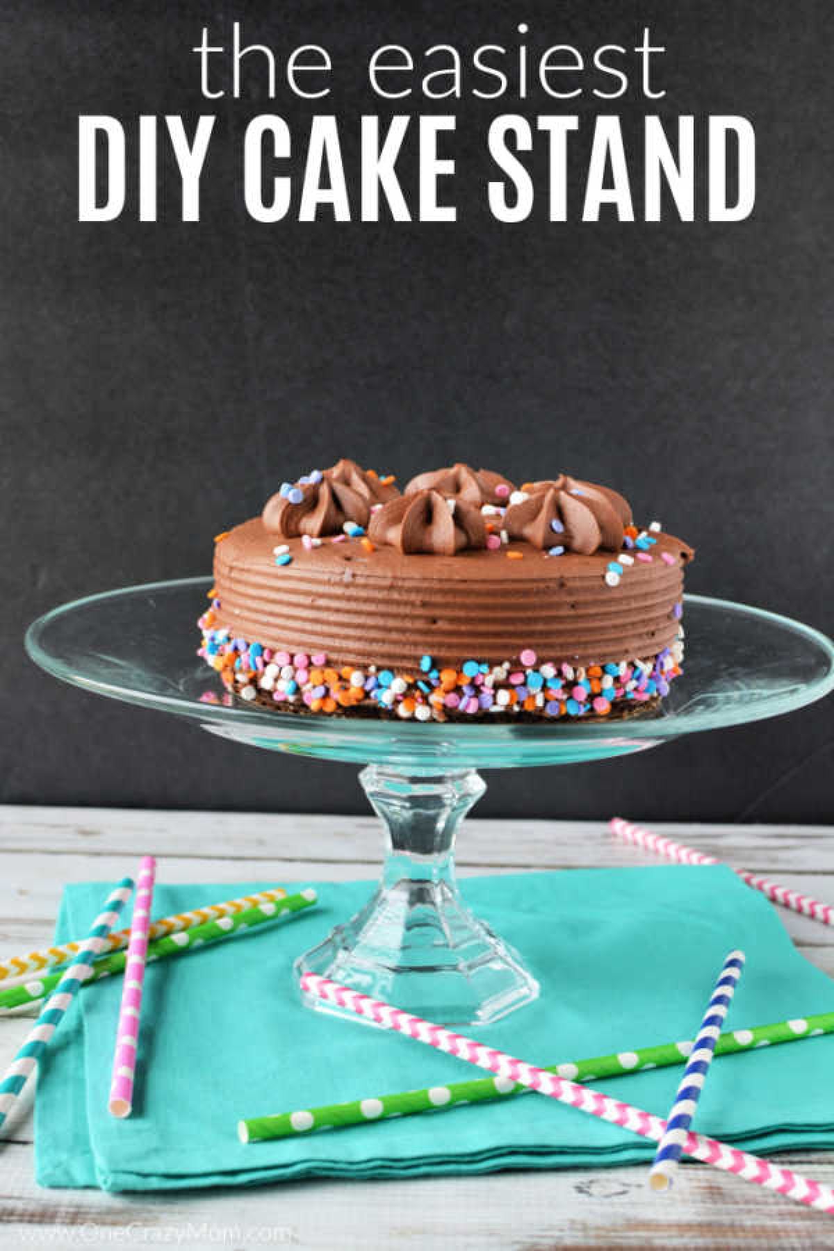 Make this DIY Cake Stand in just minutes. It is so easy and budget friendly to make a homemade cake stand. Proudly display your homemade cake stand. DIY Cake Stand with cake on top.