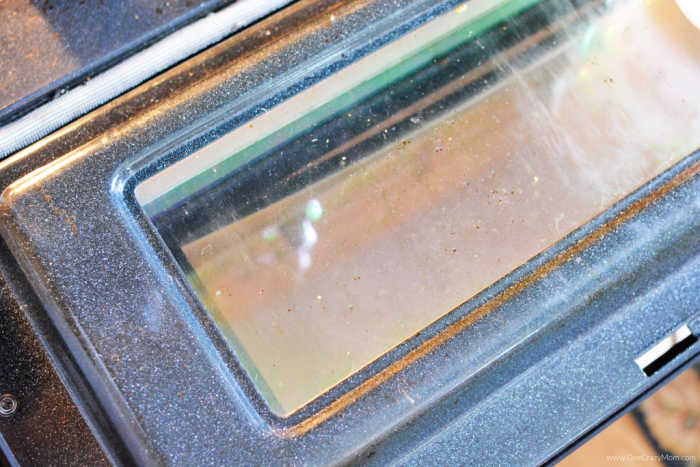 Oven door wiped off with a damp cloth. 