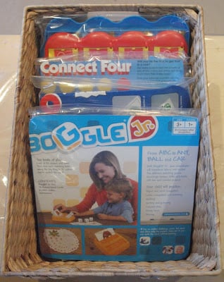 We have 10+ board game storage ideas that will get your games organized. Make game night even more fun when you get your board game collection in order. Board games in a basket.
