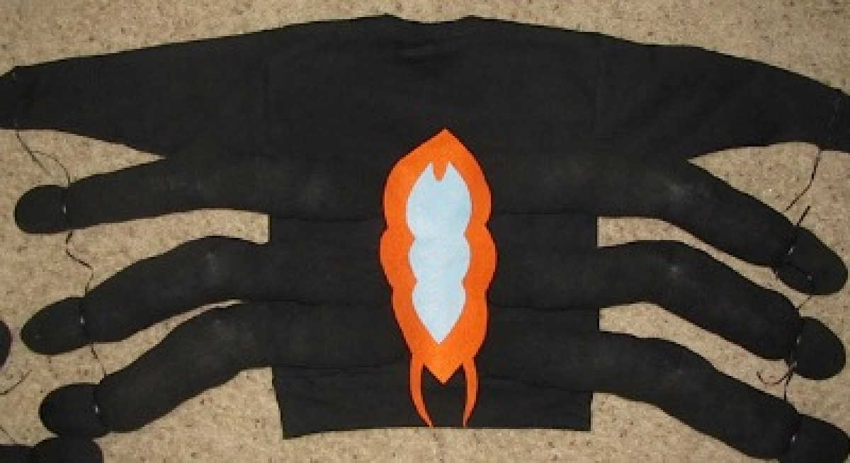 How to Make a Spider Costume in just a few minutes! This toddler spider costume is so easy. Make this DIY Spider Costume for only $8. The kids will love it.