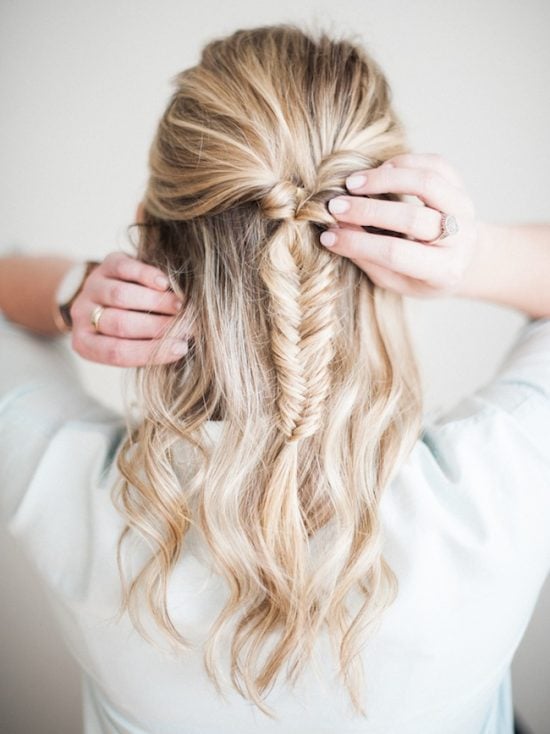 We have over 15 half up half down hairstyles that anyone can do including busy moms. These styles are easy to do and look put together and polished. Fishtair braid in hair.