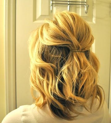 We have over 15 half up half down hairstyles that anyone can do including busy moms. These styles are easy to do and look put together and polished. Half up hairstyle for shorter hair.
