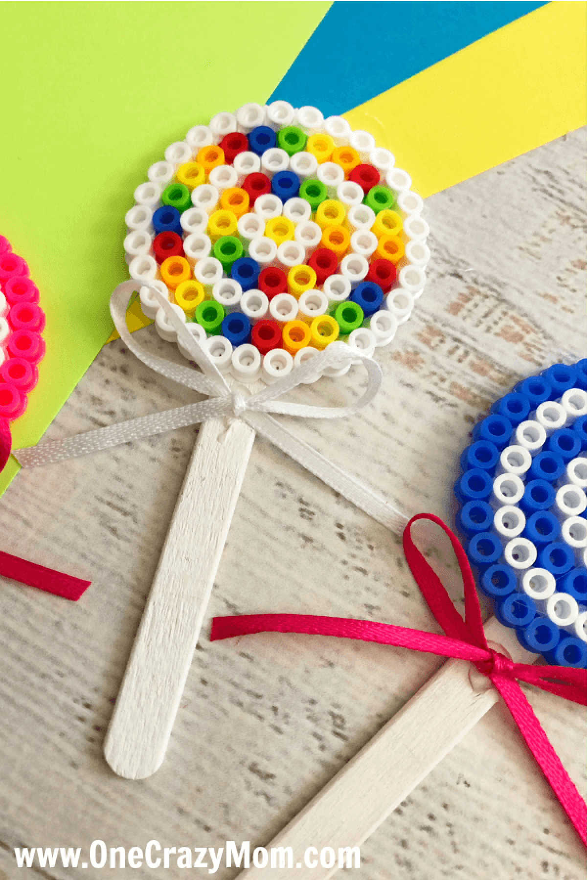 Perler beads are so fun and this Lollipop Perler Beads Craft is the perfect activity for the kids. This craft idea is simple and frugal but a blast to make! Perler beads are so fun and this Lollipop Perler Beads Craft is the perfect activity for the kids. This craft idea is simple and frugal but a blast to make!