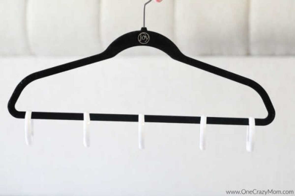 Scarf season is upon us and this diy scarf organizer will have your scarves in order. For under $1, you can make this easy diy scarf holder.