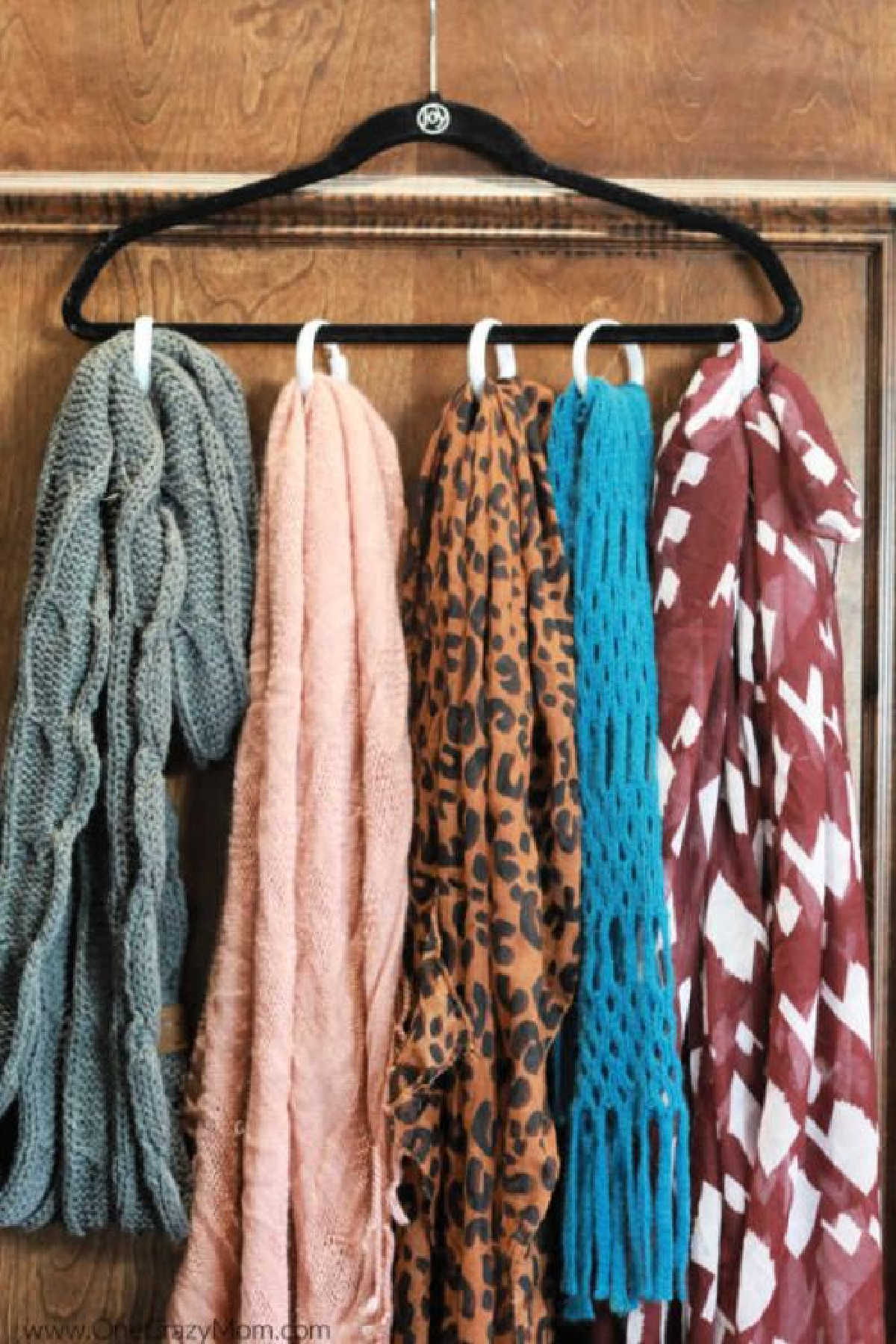 Scarf season is upon us and this diy scarf organizer will have your scarves in order. For under $1, you can make this easy diy scarf holder.
