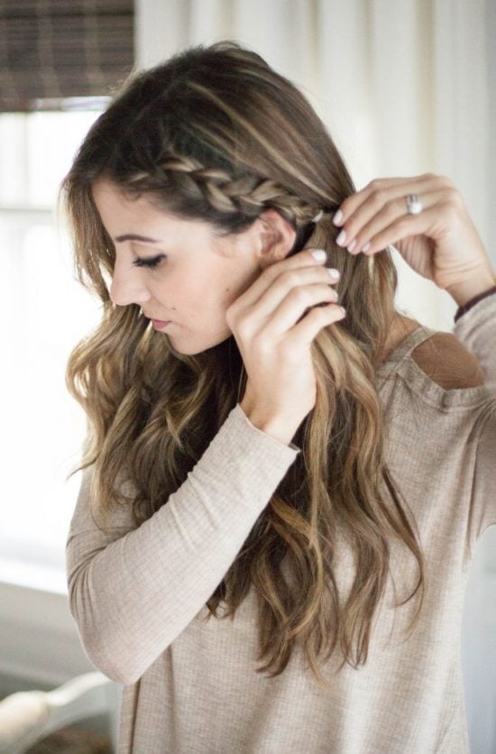 We have over 15 half up half down hairstyles that anyone can do including busy moms. These styles are easy to do and look put together and polished. Side braid in hair.