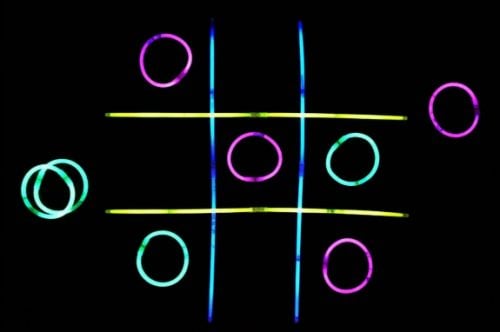 Find over 20 Glow in the dark party ideas that are easy and budget friendly. Your next party will be fabulous with these glow in the dark party decorations. Glow tic tac toe set up to play.