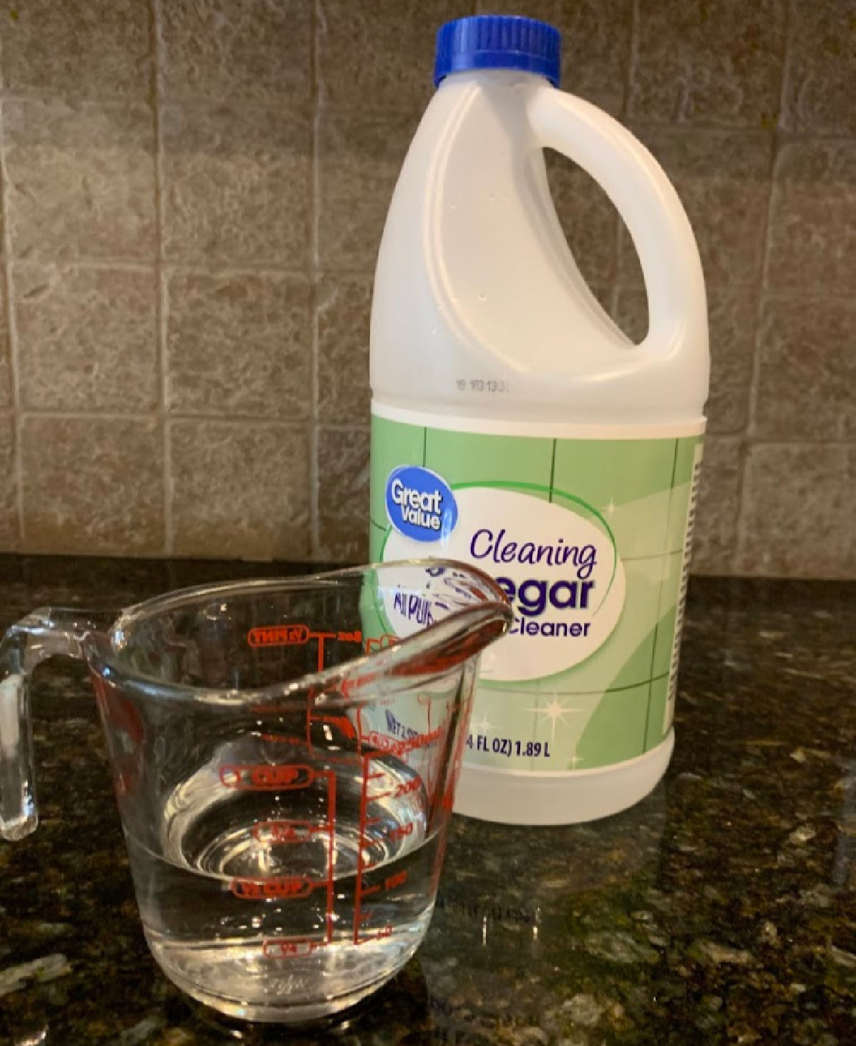 Learn how to clean microwave with vinegar. This simple microwave cleaning hack will get the job done without chemicals and works great. Supplies to clean a microwave - vinegar and water.