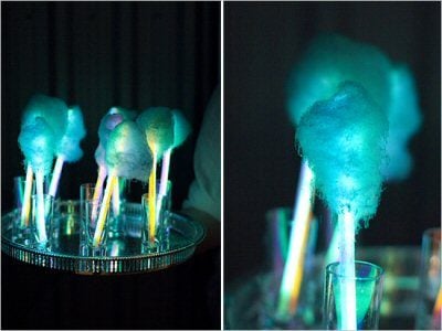 Find over 20 Glow in the dark party ideas that are easy and budget friendly. Your next party will be fabulous with these glow in the dark party decorations. Stacks of glow cotton candy.