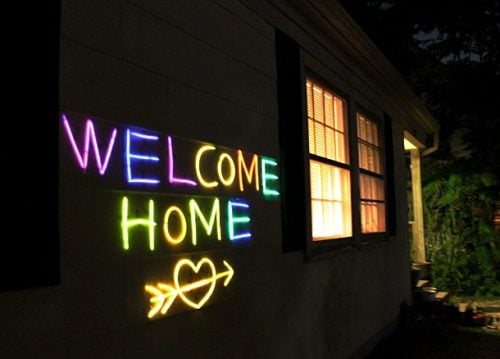 Find over 20 Glow in the dark party ideas that are easy and budget friendly. Your next party will be fabulous with these glow in the dark party decorations. Glow in the dark sign on the outside of house.
