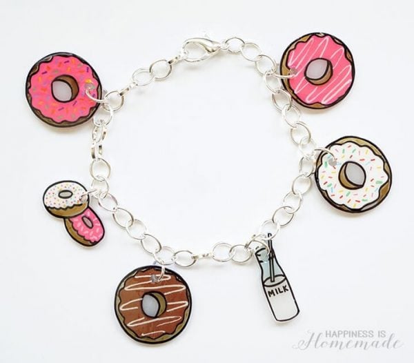 Everyone will have a blast making these 25 Shrinky Dink ideas that are easy to make. Find ideas from key chains and necklaces to magnets and much more! Bracelet with shrinky dink charms.